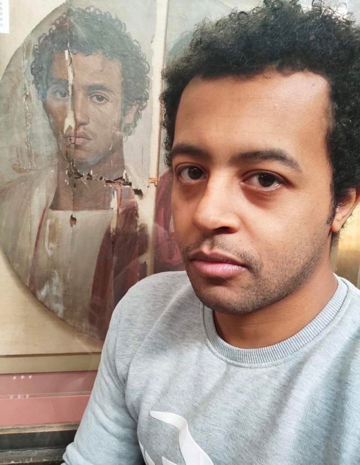Modern Egyptian with mummy portrait.