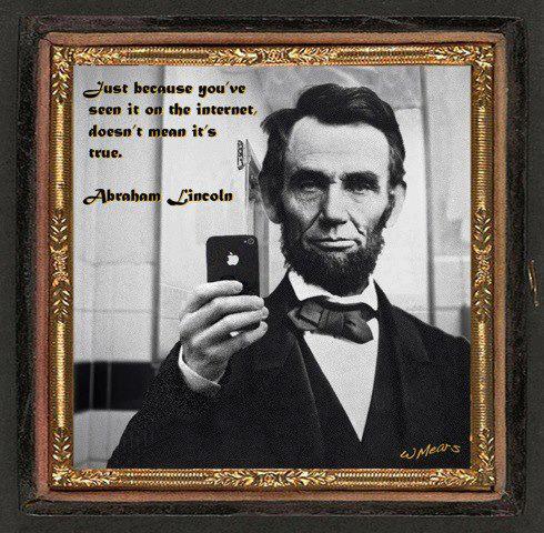 Abe Lincoln using his iPhone.