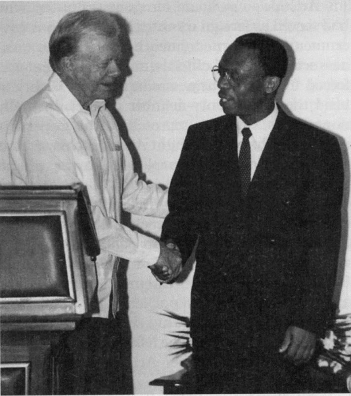 Jimmy Carter with Jean-Bertrand Aristide.