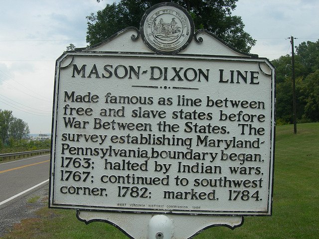 Sign marking the Mason & Dixon Line.