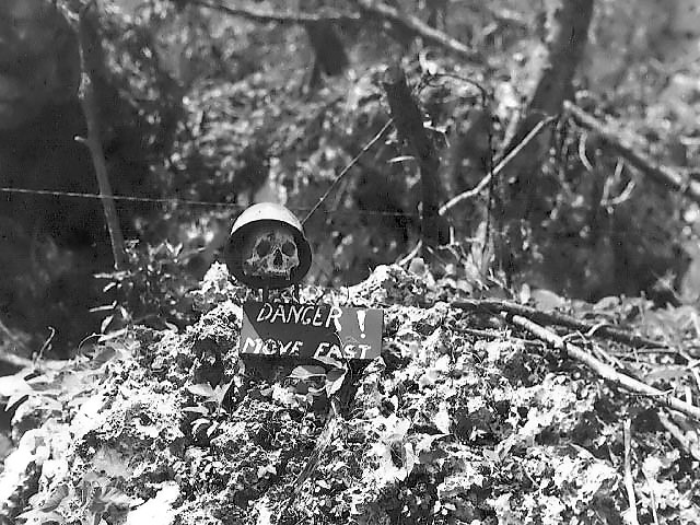 Danger sign on Peleliu with skull.