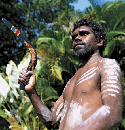Aborigine with boomerang.