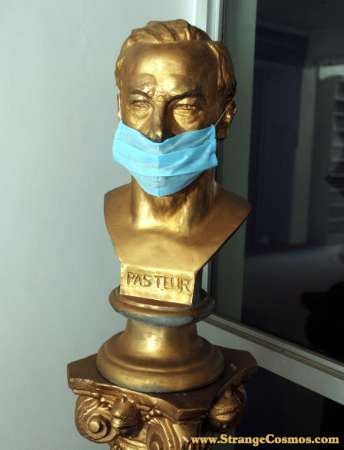 Bronze bust with mask.